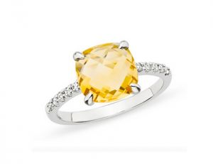 Yellow citrine center stone accented with 10 round-cut diamonds in 14-karat white-gold setting.jpg